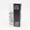 Close-up showing the compact, white Dark Horse Extra Slim Carbon Filter designed for smoother smoking.