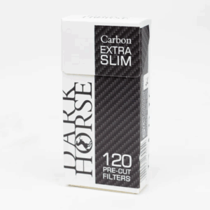 Close-up showing the compact, white Dark Horse Extra Slim Carbon Filter designed for smoother smoking.