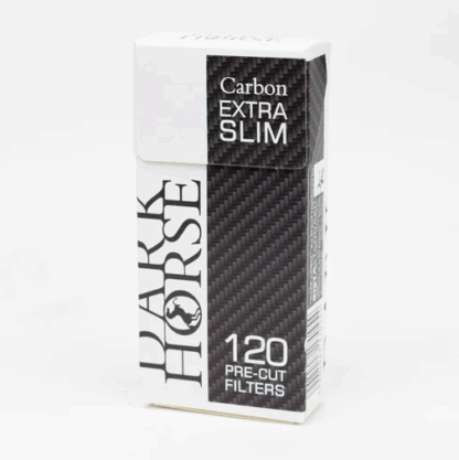 Close-up showing the compact, white Dark Horse Extra Slim Carbon Filter designed for smoother smoking.