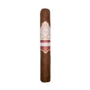 Rocky Patel Grand Reserve cigar on a wooden table.