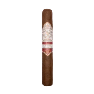 Rocky Patel Grand Reserve cigar on a wooden table.