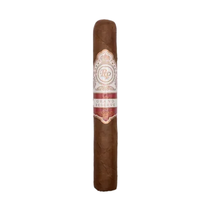Rocky Patel Grand Reserve cigar on a wooden table.