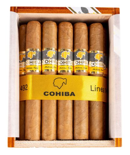 Close-up of a Cohiba Siglo II cigar with a golden band on a wooden box.
