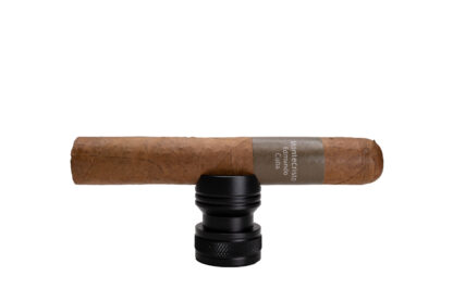 Montecristo Edmundo Cuban cigar on a black cigar stand.