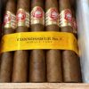 A luxurious wooden box of H. Upmann Connoisseurs No. 2 cigars, neatly arranged with each cigar showcasing its signature Cuban craftsmanship. The box features the iconic H. Upmann branding, with a golden seal and elegant presentation, emphasizing its premium quality.