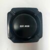 op view of Export A Black Ashtray showing circular grooves and deep center bowl for ash collection.
