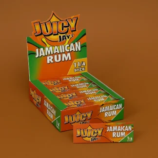 A 24-pack box of Juicy Jay Jamaican Rum 1 1/4 flavored rolling papers displayed on a neutral background, designed for bulk purchase.